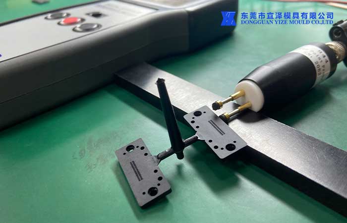 Peek anti-static plastic injection molding parts in resistance measurement.jpg